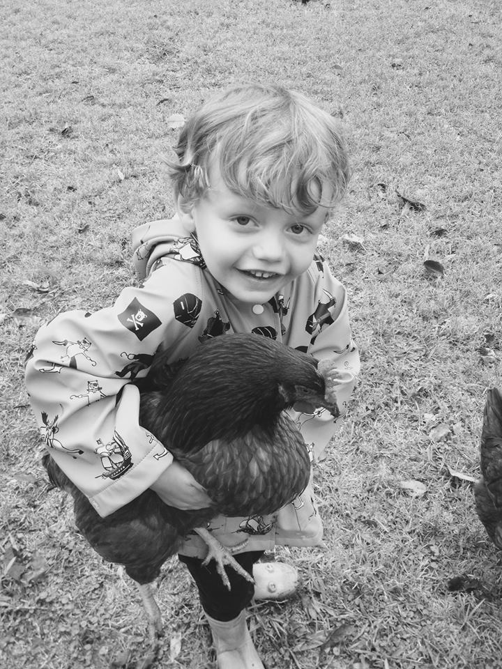 Gregory with chickens
